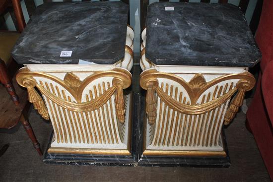Glass top table on a pair of pedestals
